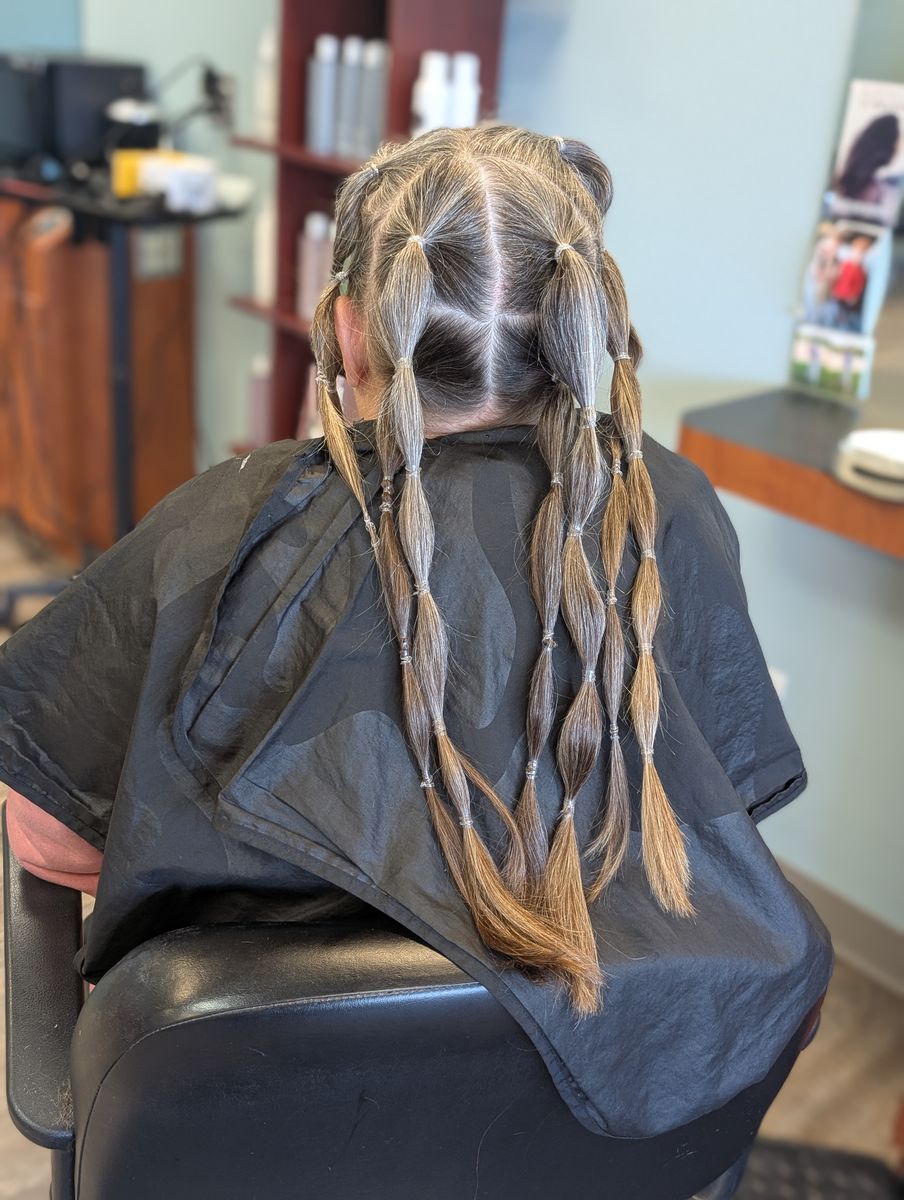 Deanna donating her hair before chemo